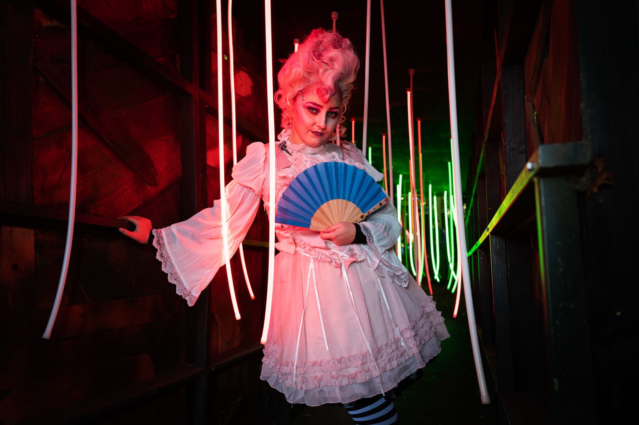 scary woman standing in dark corridor